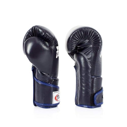 Fairtex BGV6 Angular Boxing Gloves, Locked Thumb Muay Thai MMA Kickboxing | Premium synthetic body with triple-layer foam padding. Joint protection and firm wrist support safeguard hands on heavy bags - color: Blue, size: 14oz