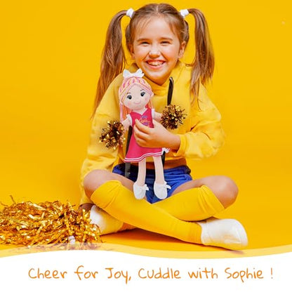 June Garden 14" Snuggle Cuties Cheerleader Sophie - Soft Cuddly Plush Doll Gift for Girls - Huggable Rag Doll - Pink M - color: Pink Cheerleader Sophie, size: Medium